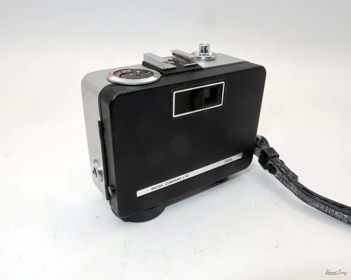 Different angles of the Ricoh Auto Half E2 camera
