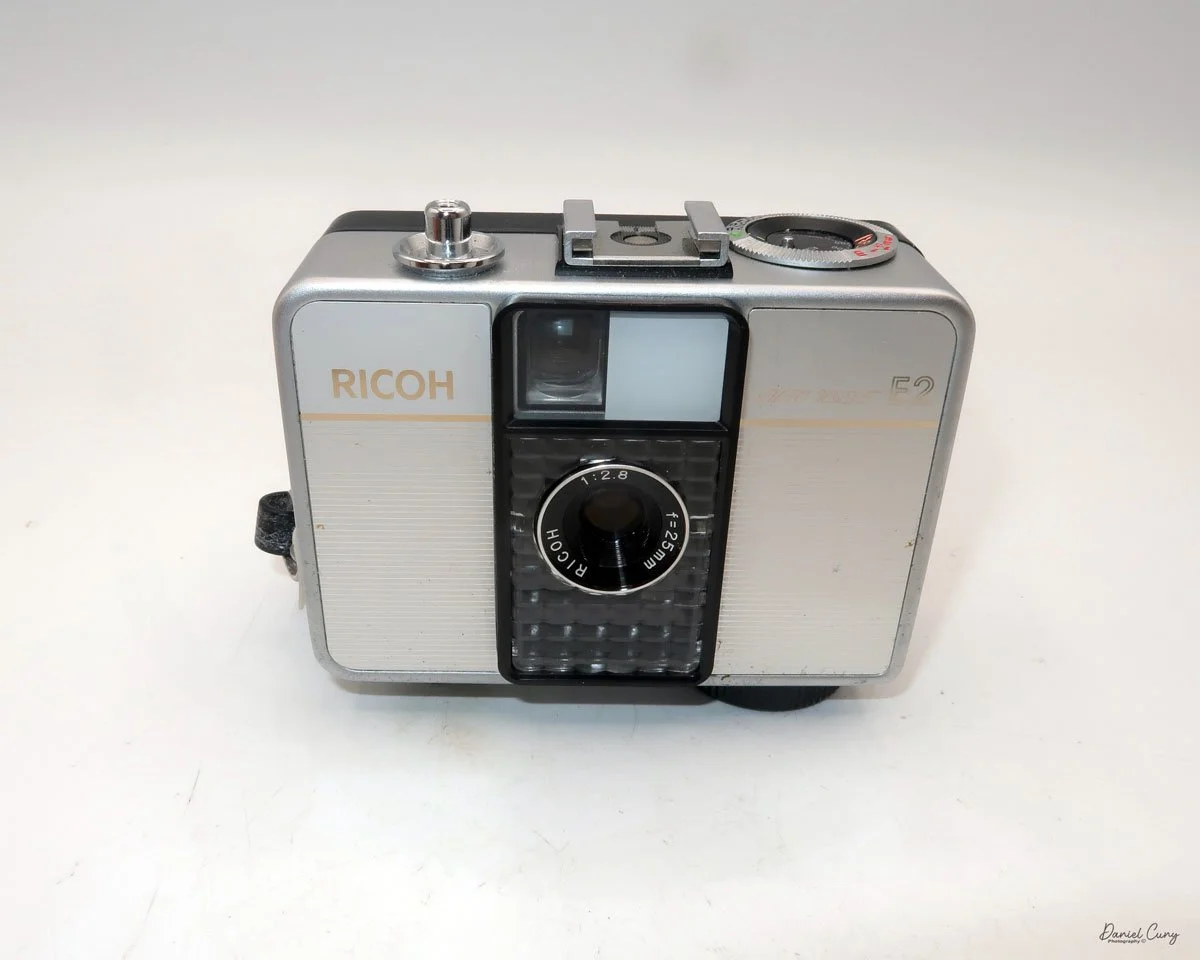 Different angles of the Ricoh Auto Half E2 camera
