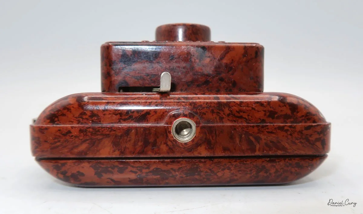 Bottom of camera.