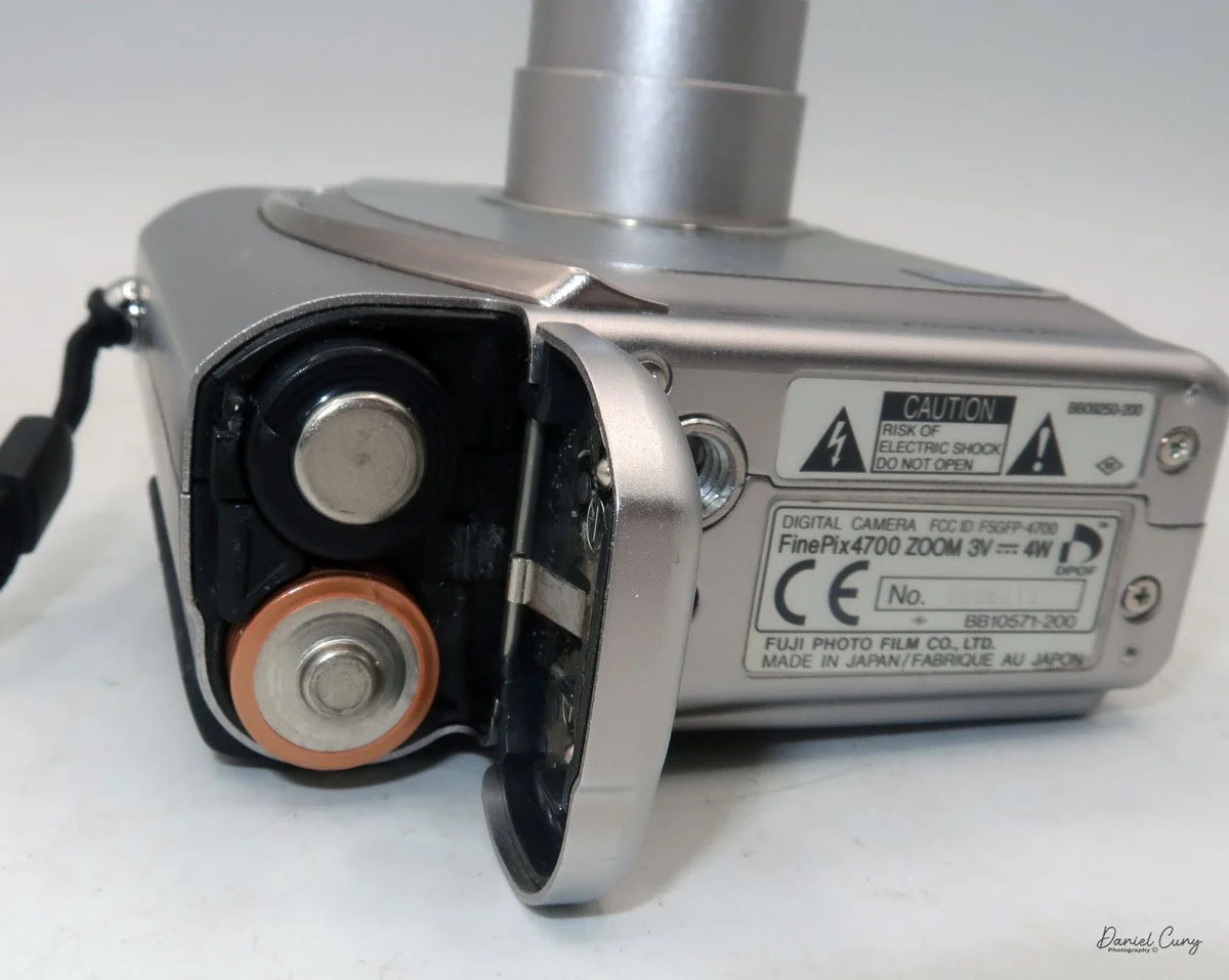 2-AA batteries loaded into the camera