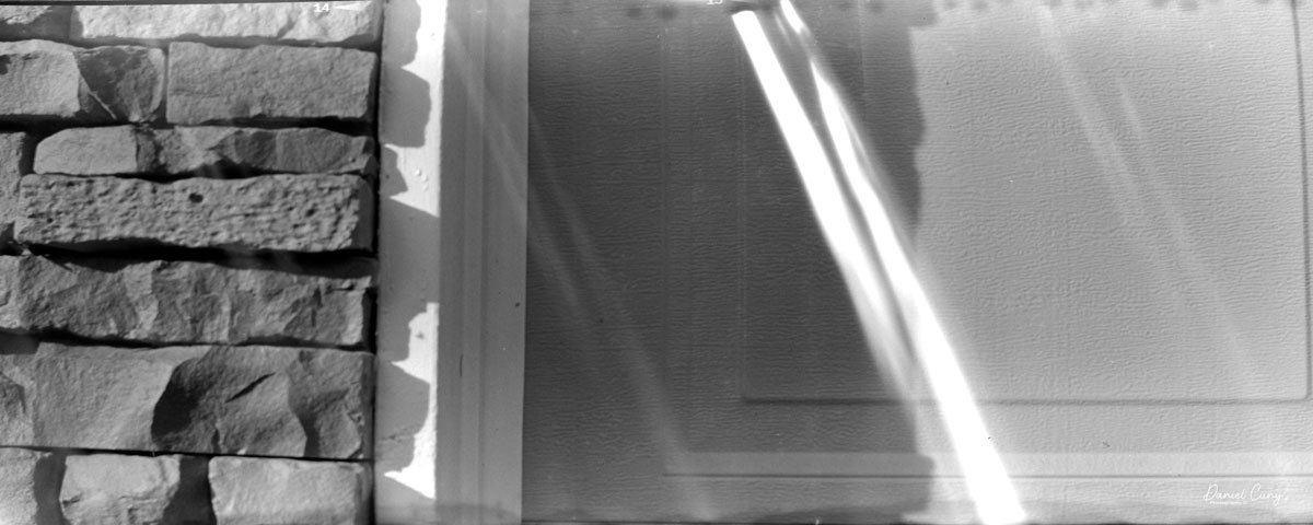 Stone next to the garage door