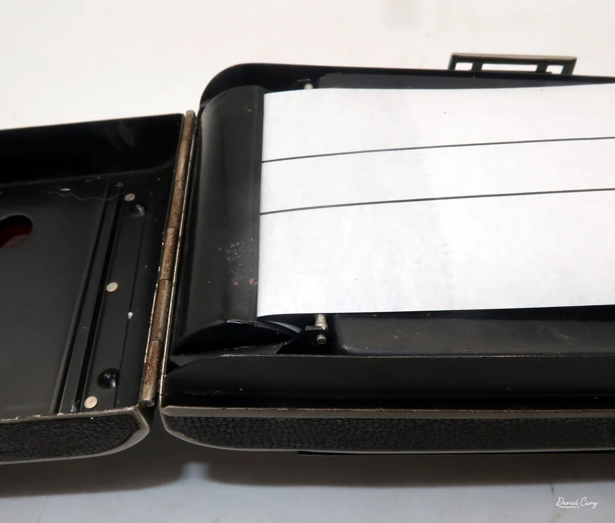 Push down after spool is in the holder