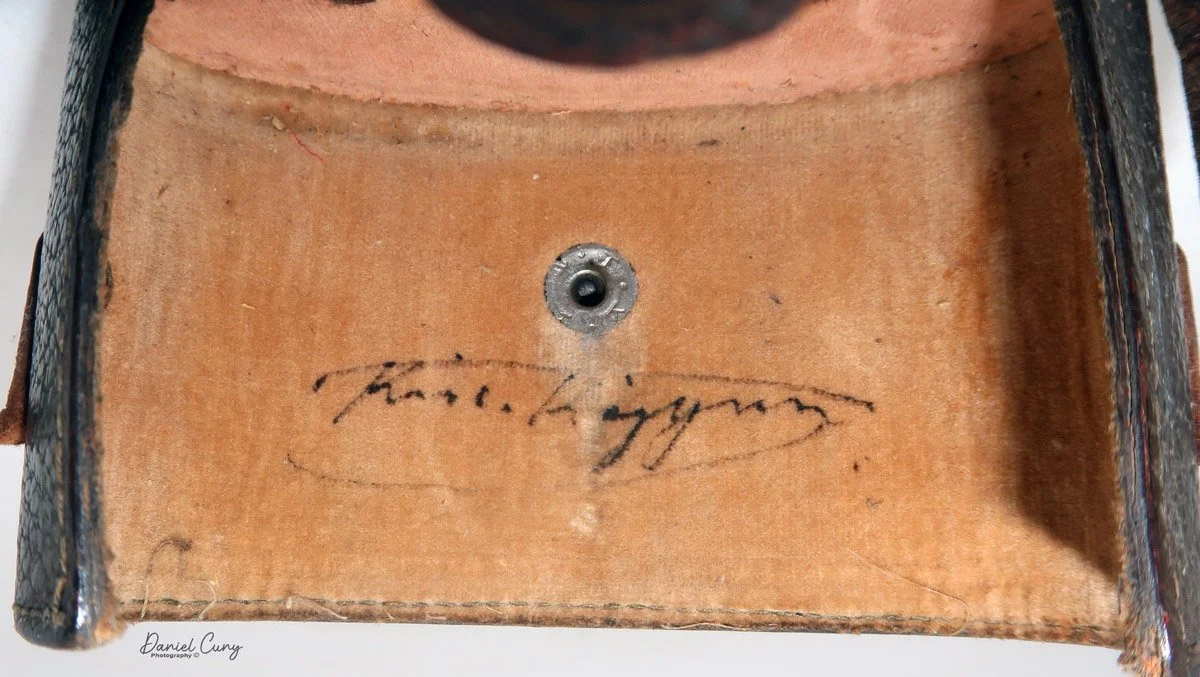 Signature on the back.