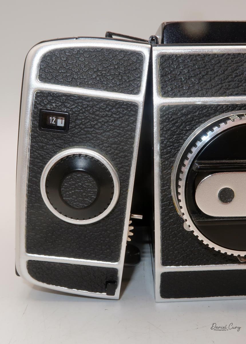 Botton on the bottom to remove film back