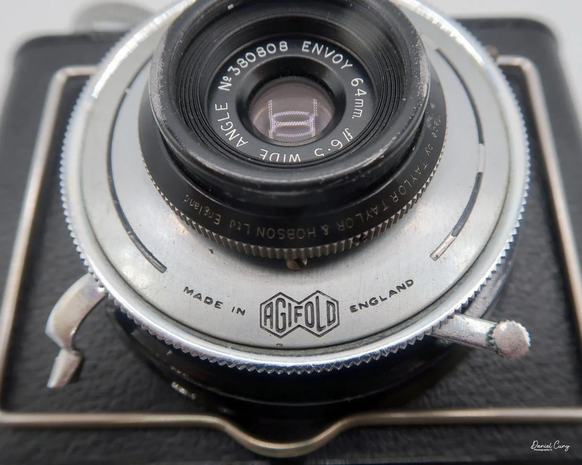 Shutter cocking lever and release.