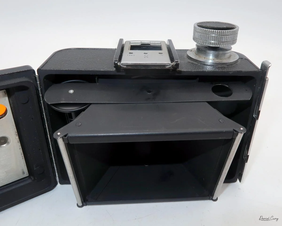 Pulling ut the film insert to load film.