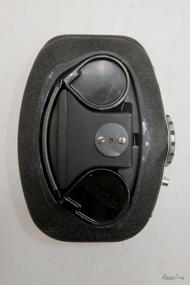 Door off revealing film cassettes