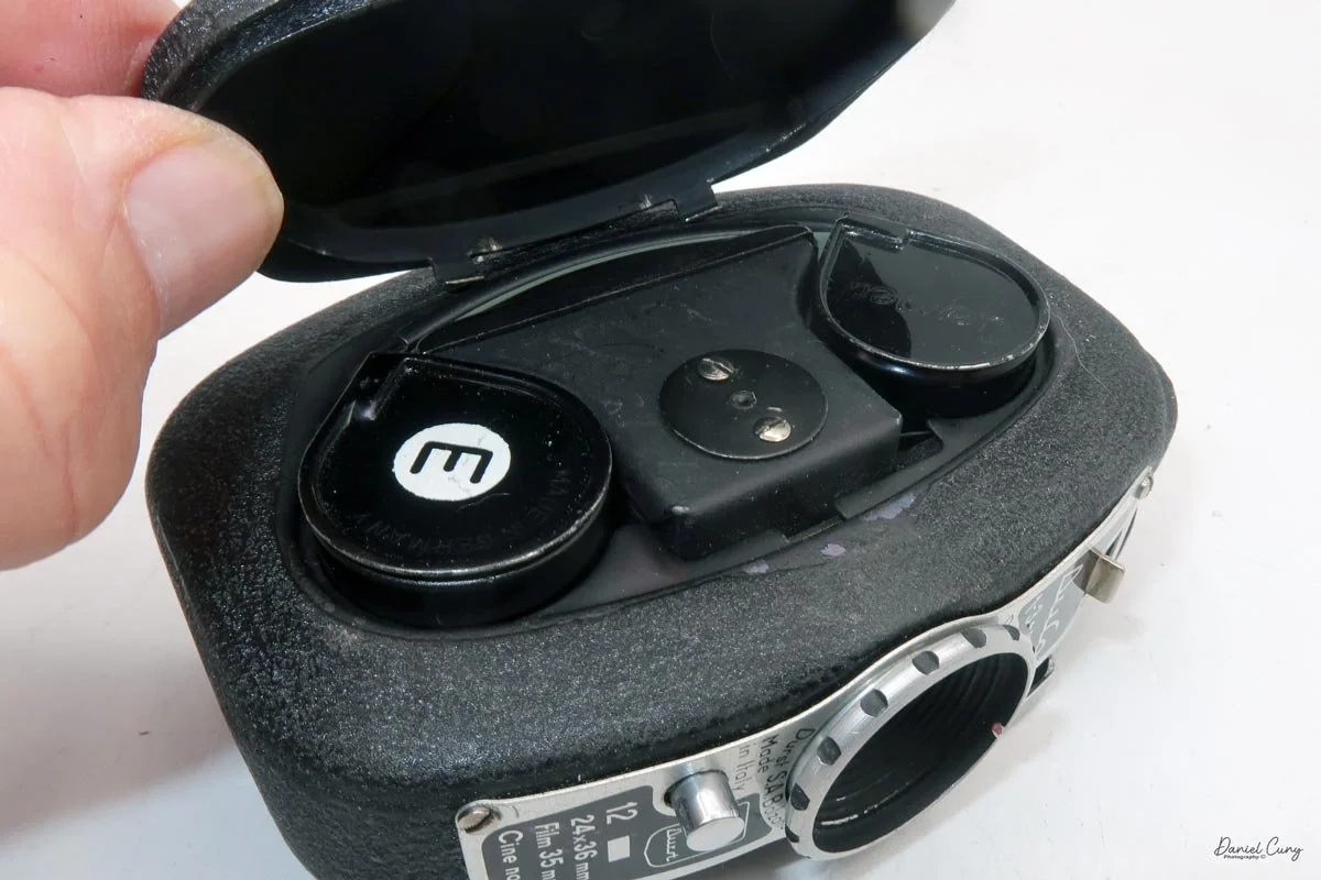 Putting the film door onto camera