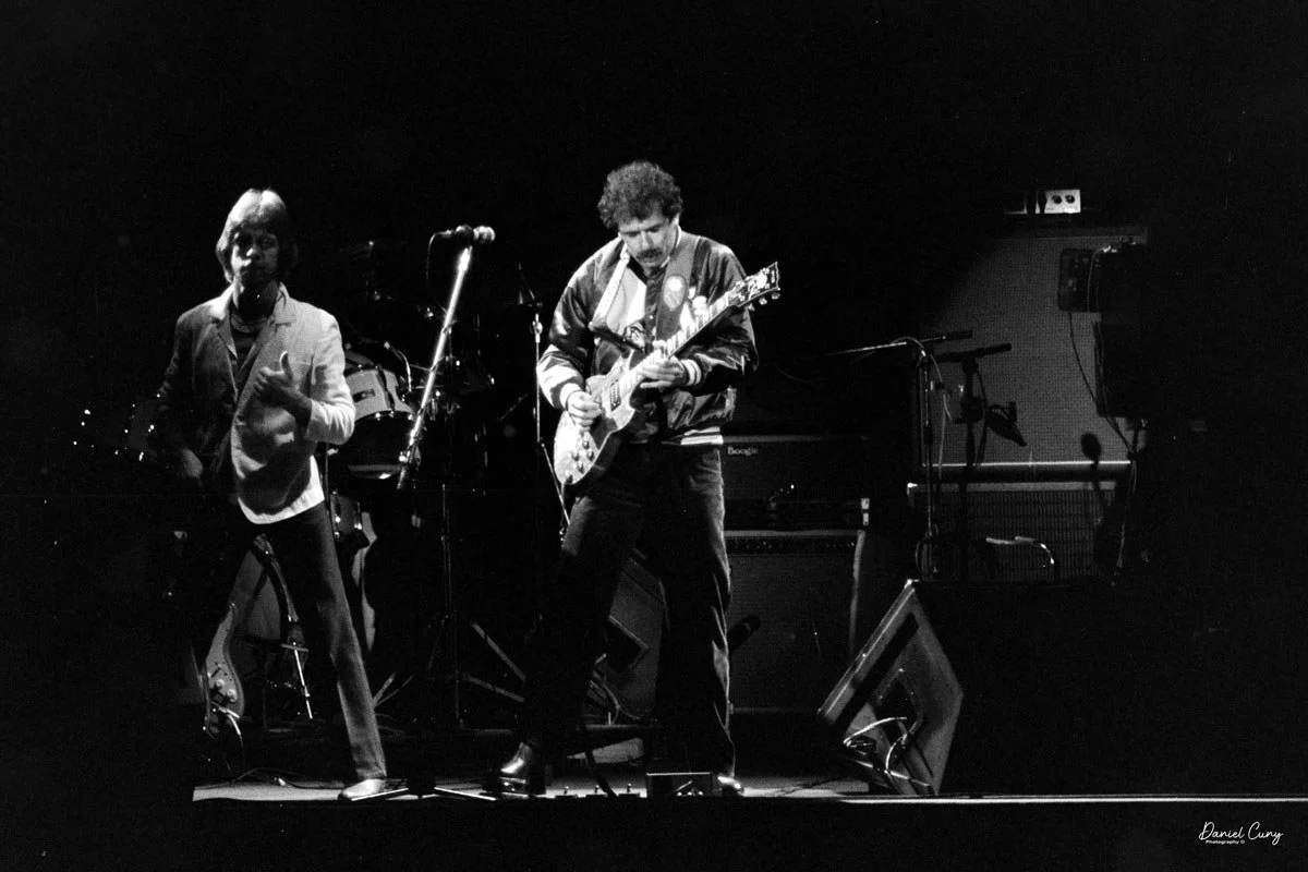 Carlos Santana wearing Oaklnad A's jacket