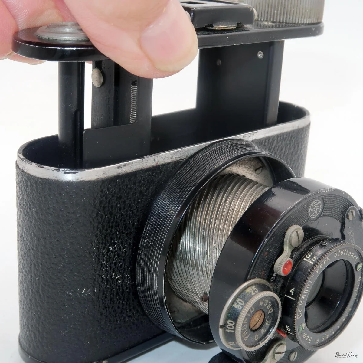 Lifting film chamber from camera body