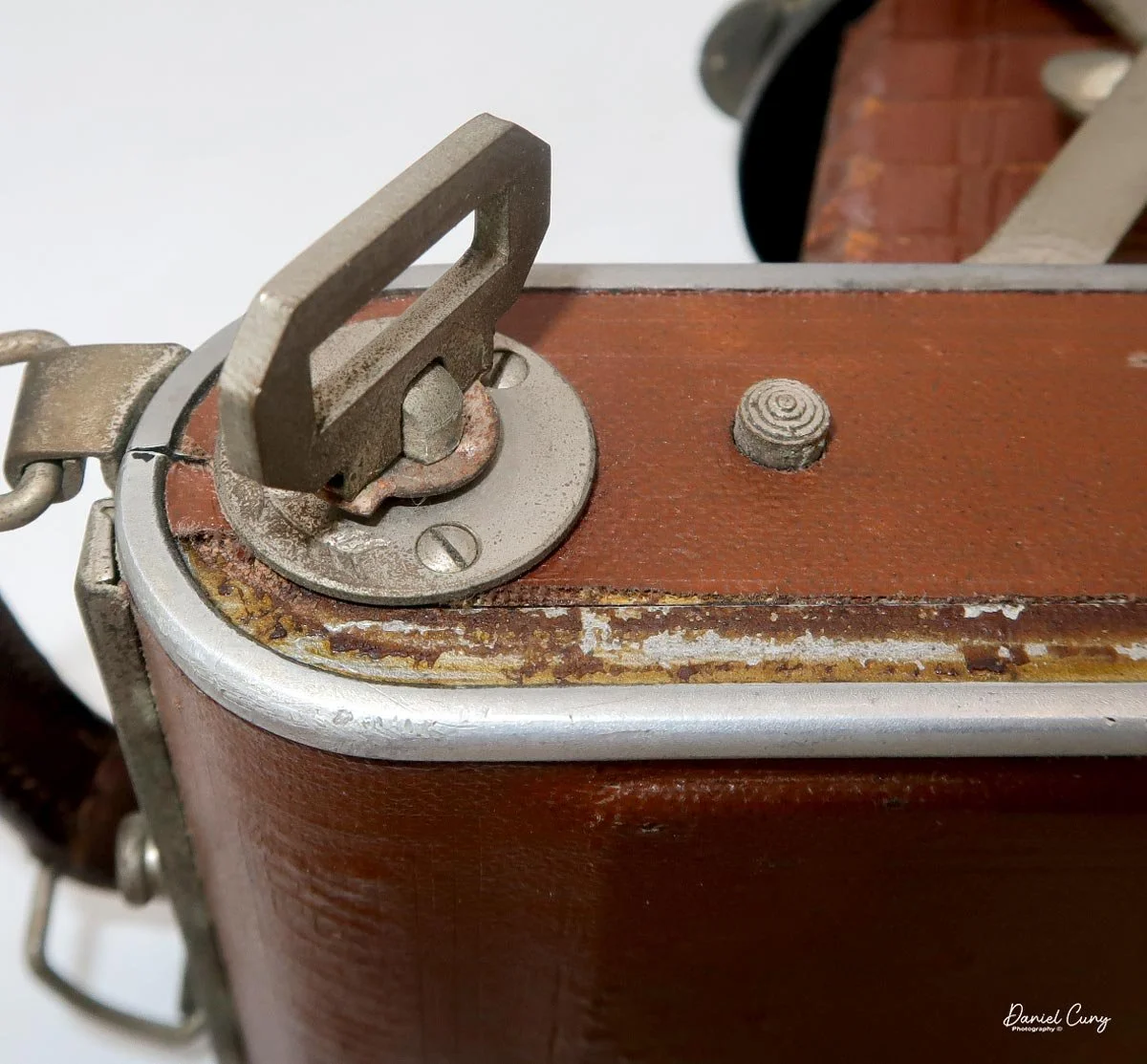 Opening button and winding lever