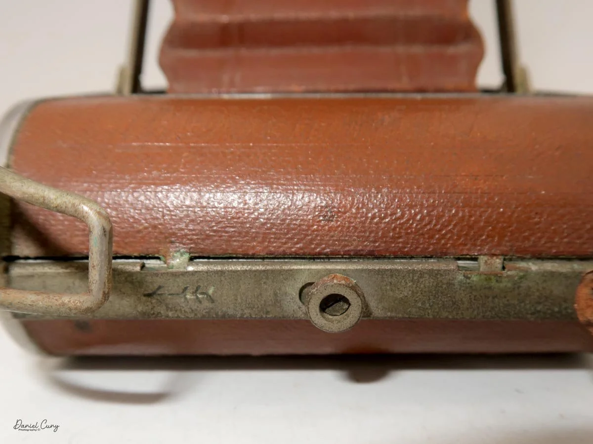 Lever to open the film back