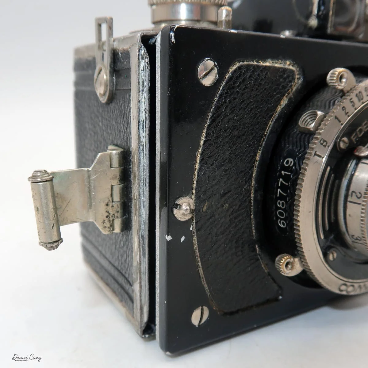 Flip back clips to remove the film back