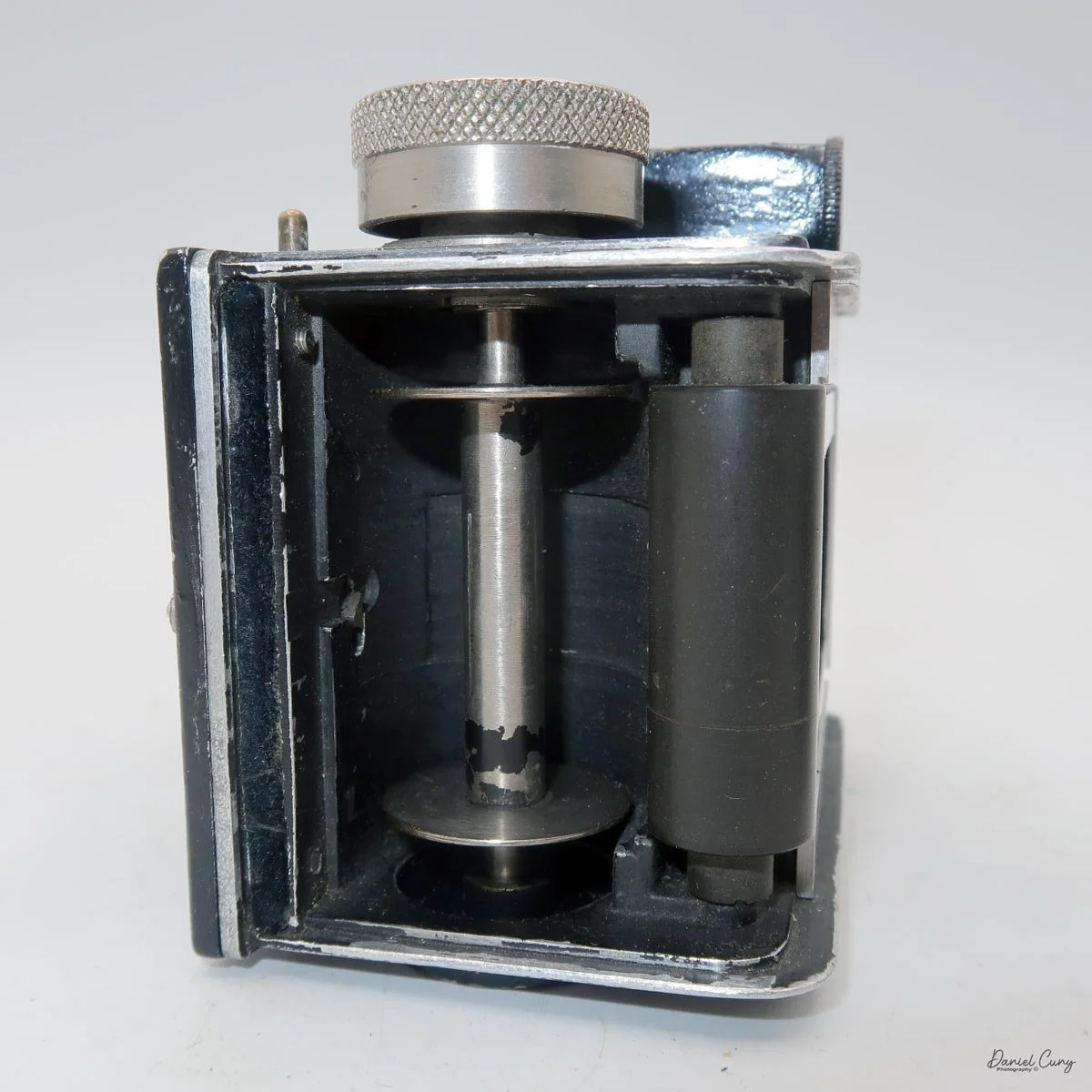 Film back removed showing film spools