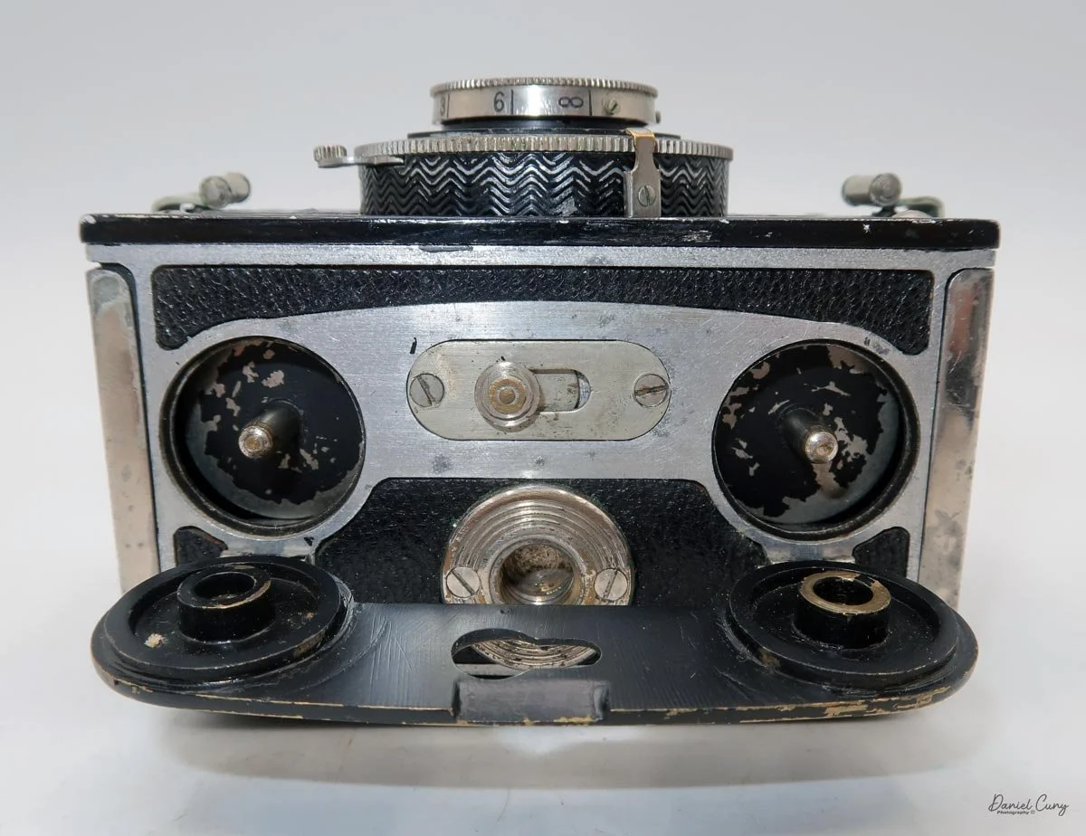 Bottom door opened showing film spools