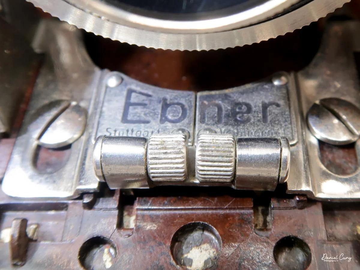 Ebner plate and locking bar.
