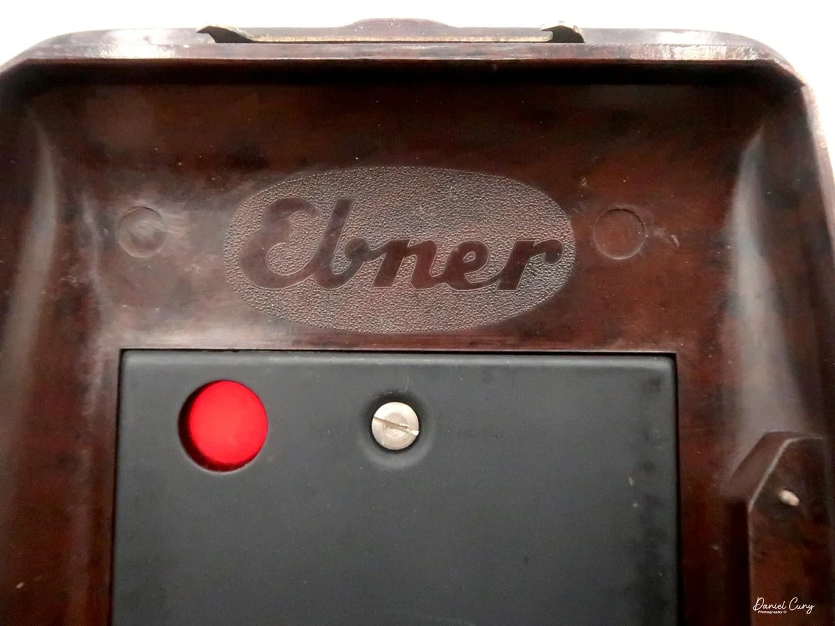 Ebner embossed on pressure plate door.
