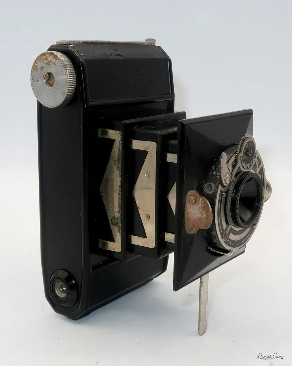 Different angles of the Minolta Vest camera