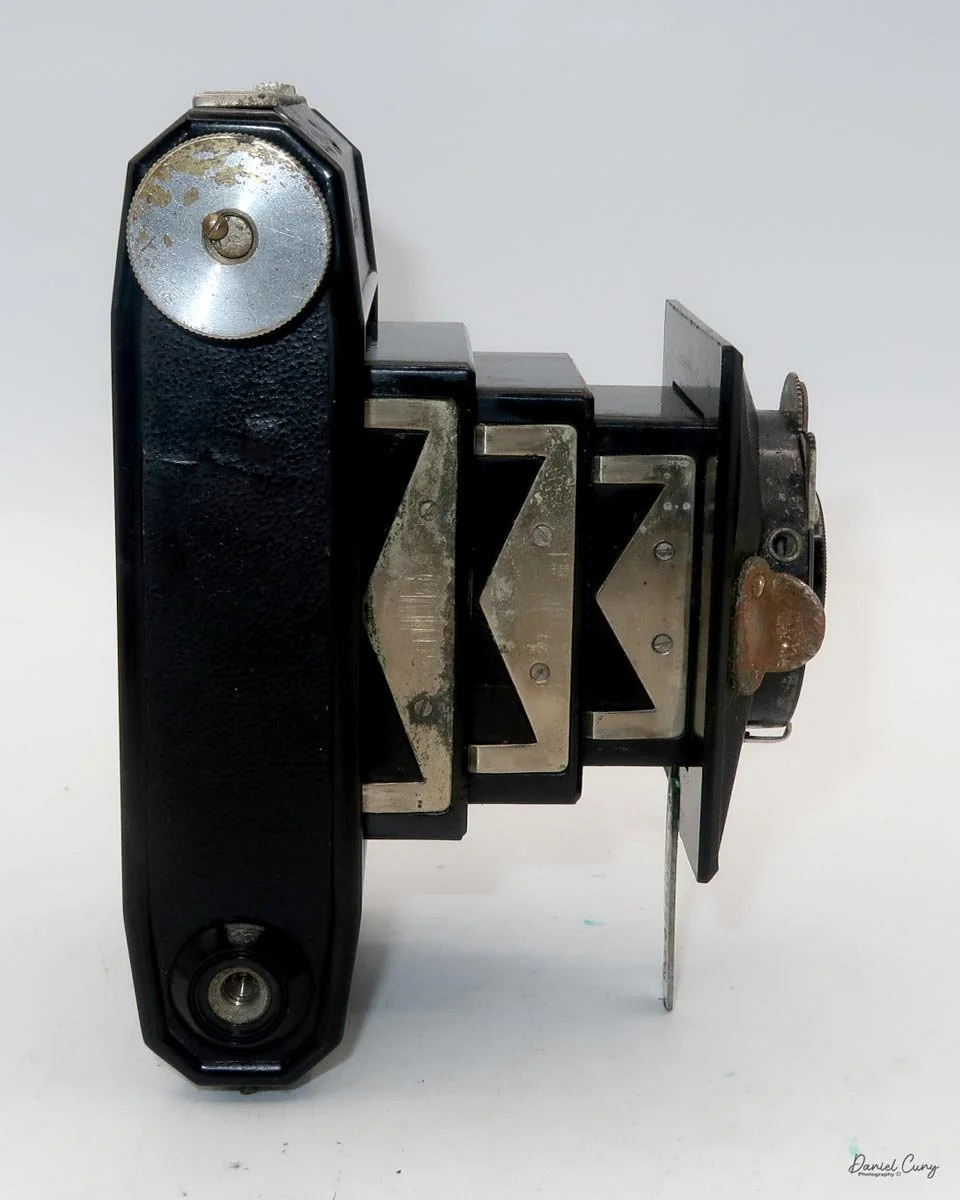 Different angles of the Minolta Vest camera