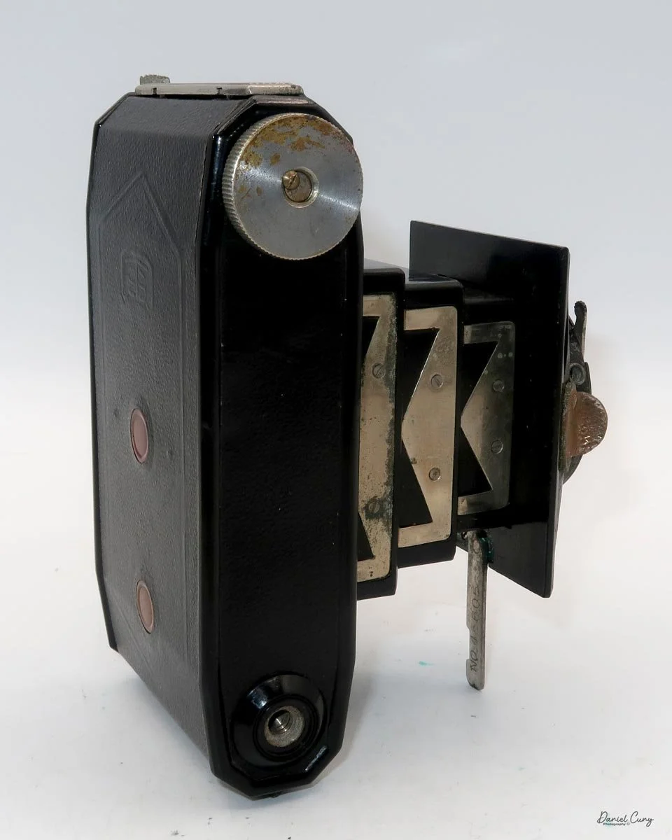 Different angles of the Minolta Vest camera