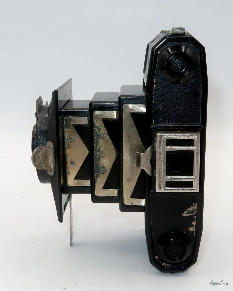 Different angles of the Minolta Vest camera