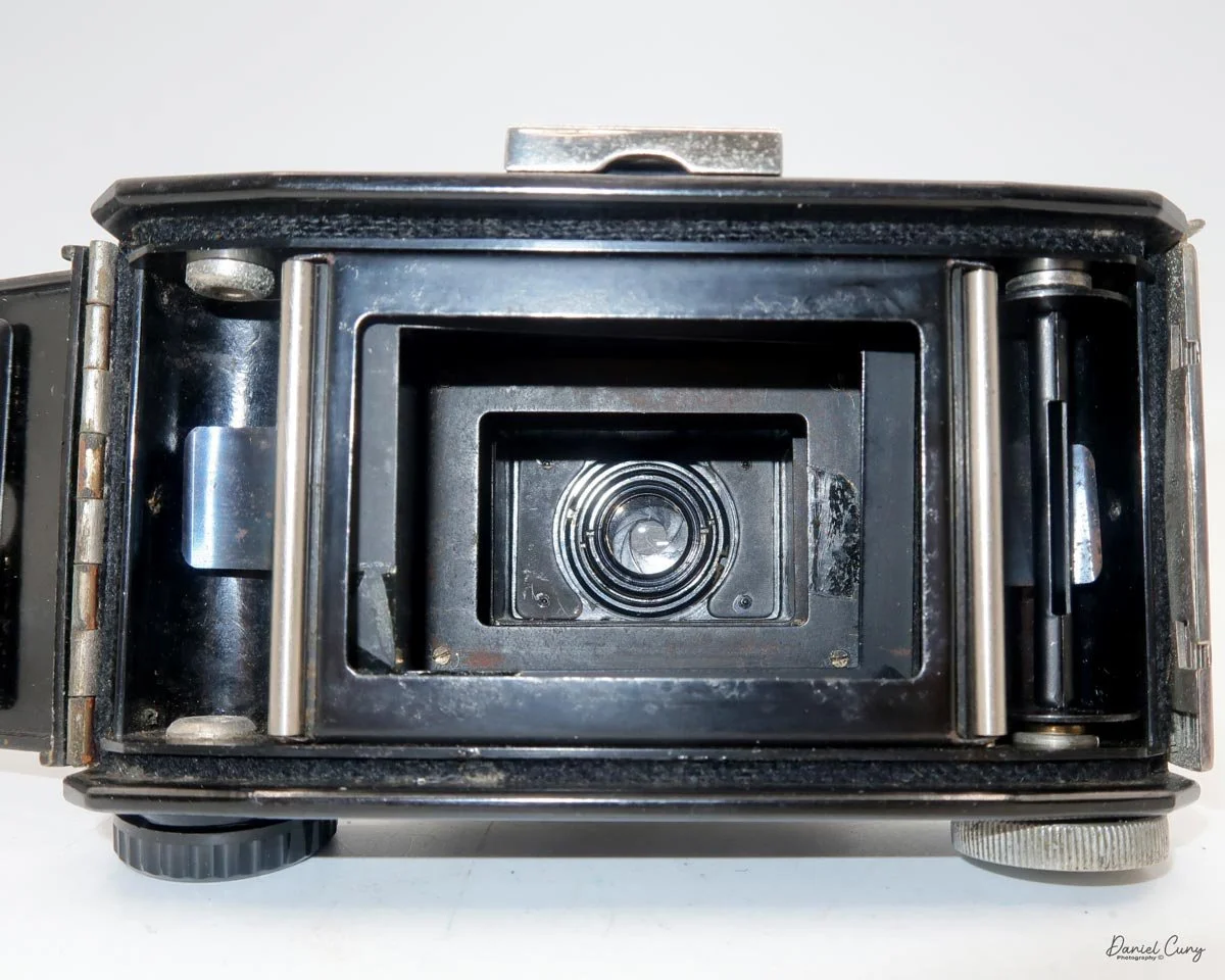 Film chamber with lens extended.
