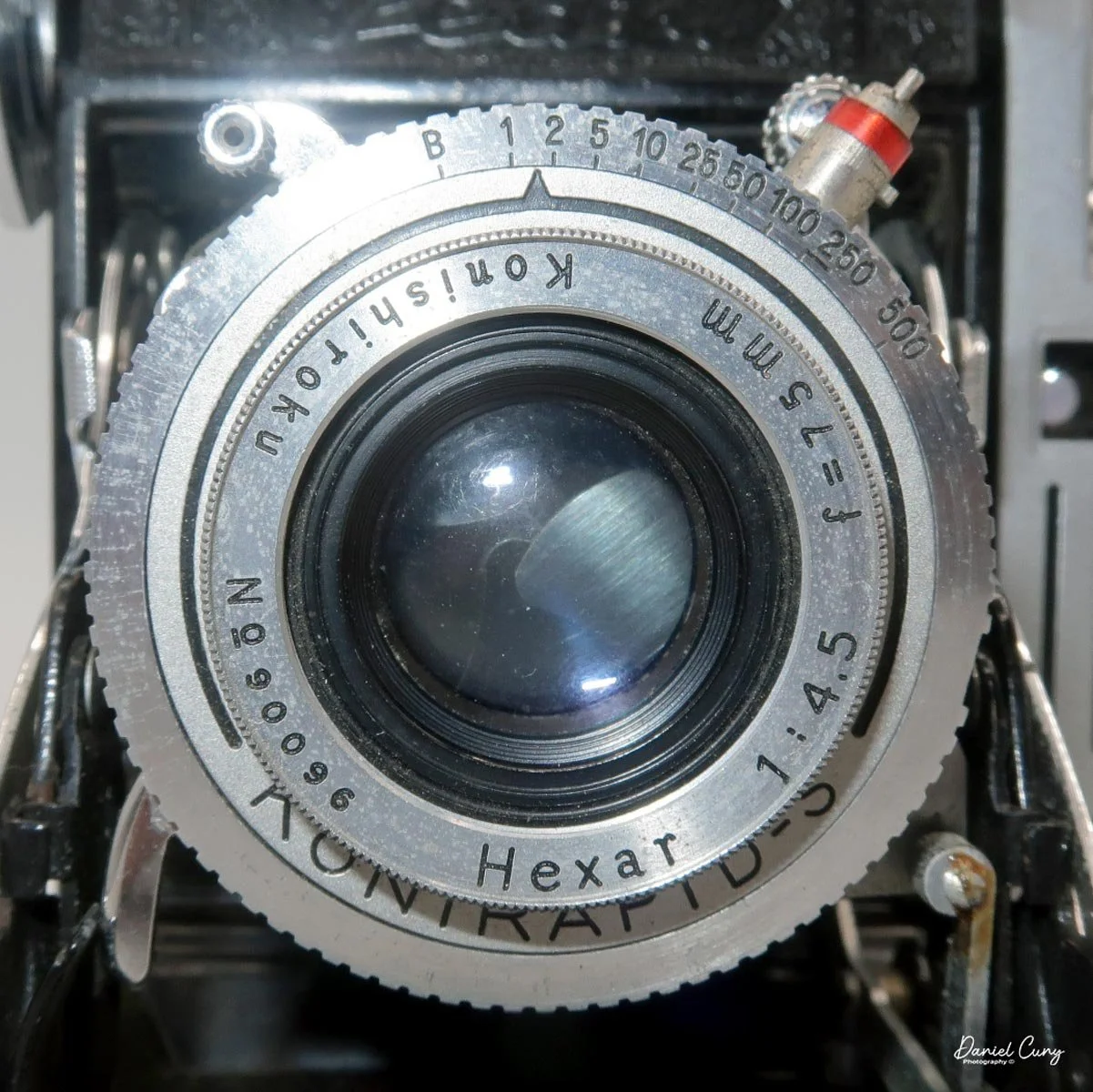 Full view of Hexar lens, Cocking lever and ASA flash term.