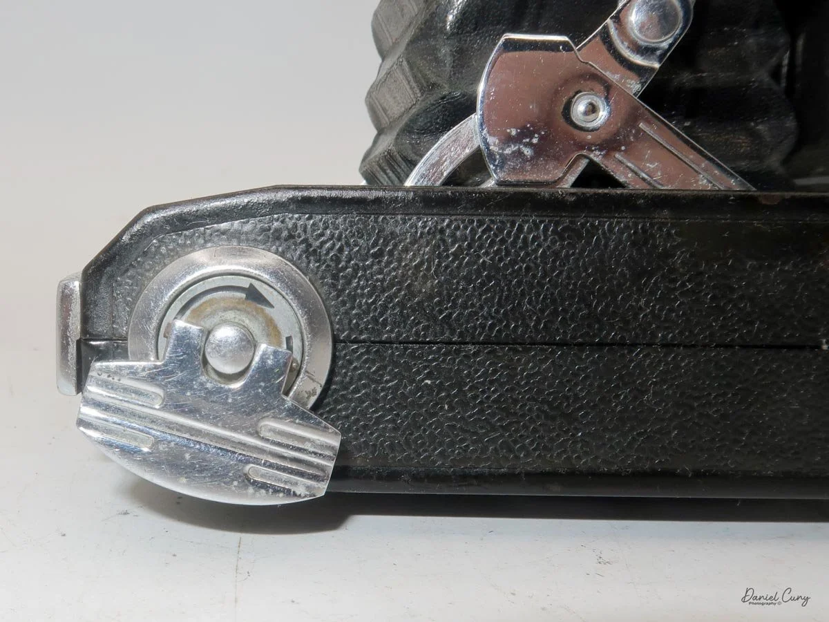 Large film winding key.