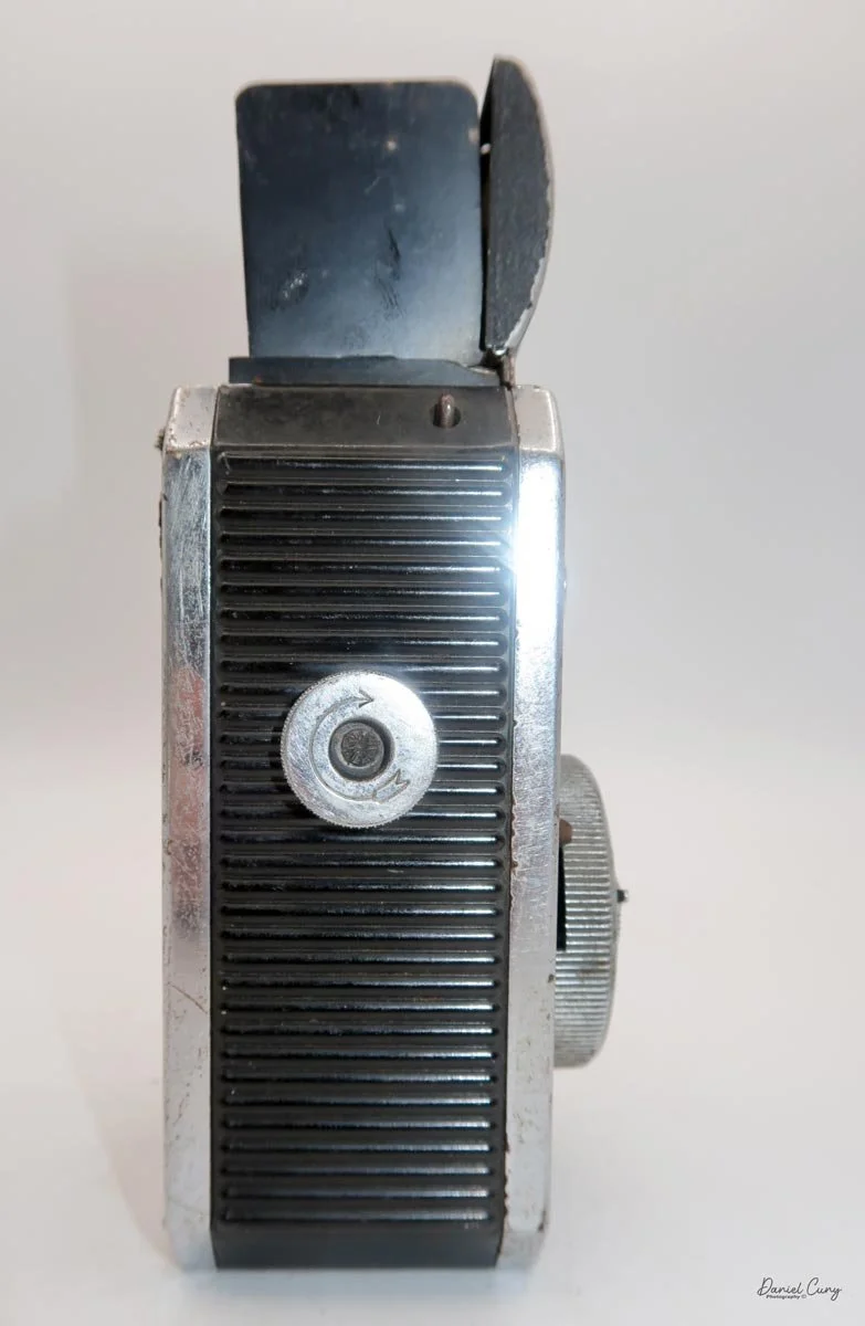 Film winding knob on right side.