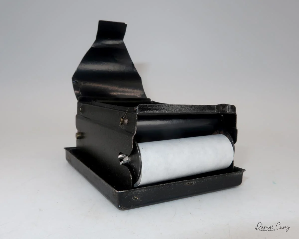 Film threaded through slot