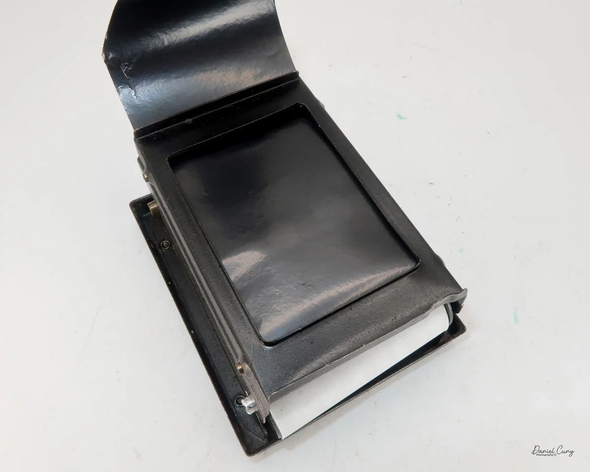 Make sure film is flat across the film plane