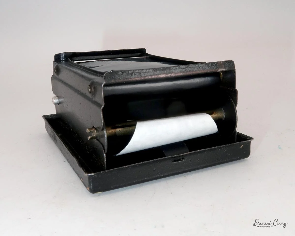 Thread film onto take up spool.