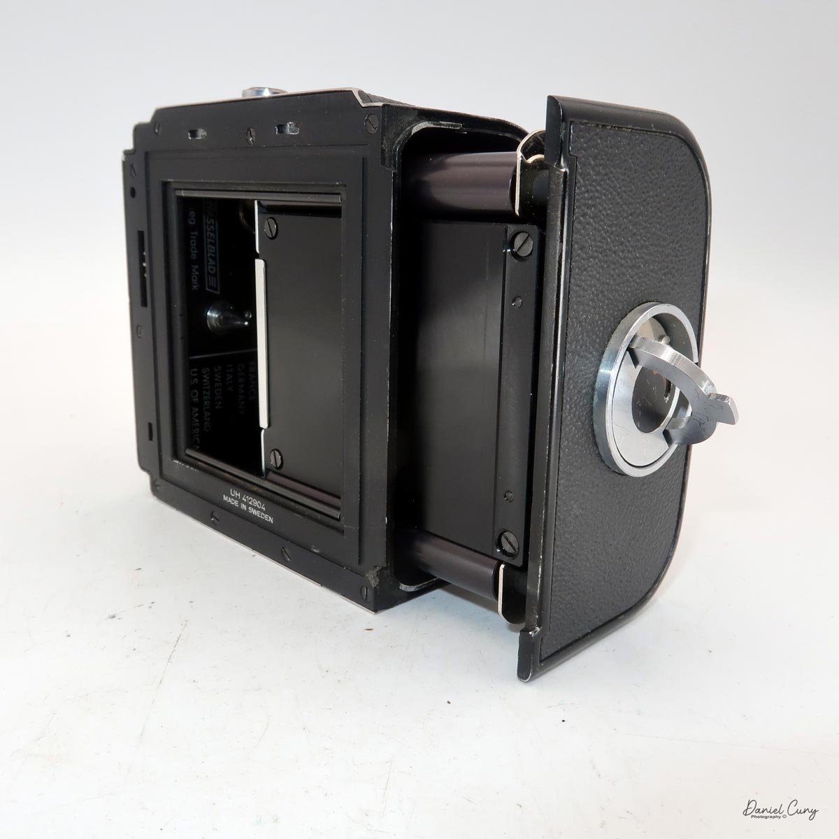 Unlock door and pull out film chamber