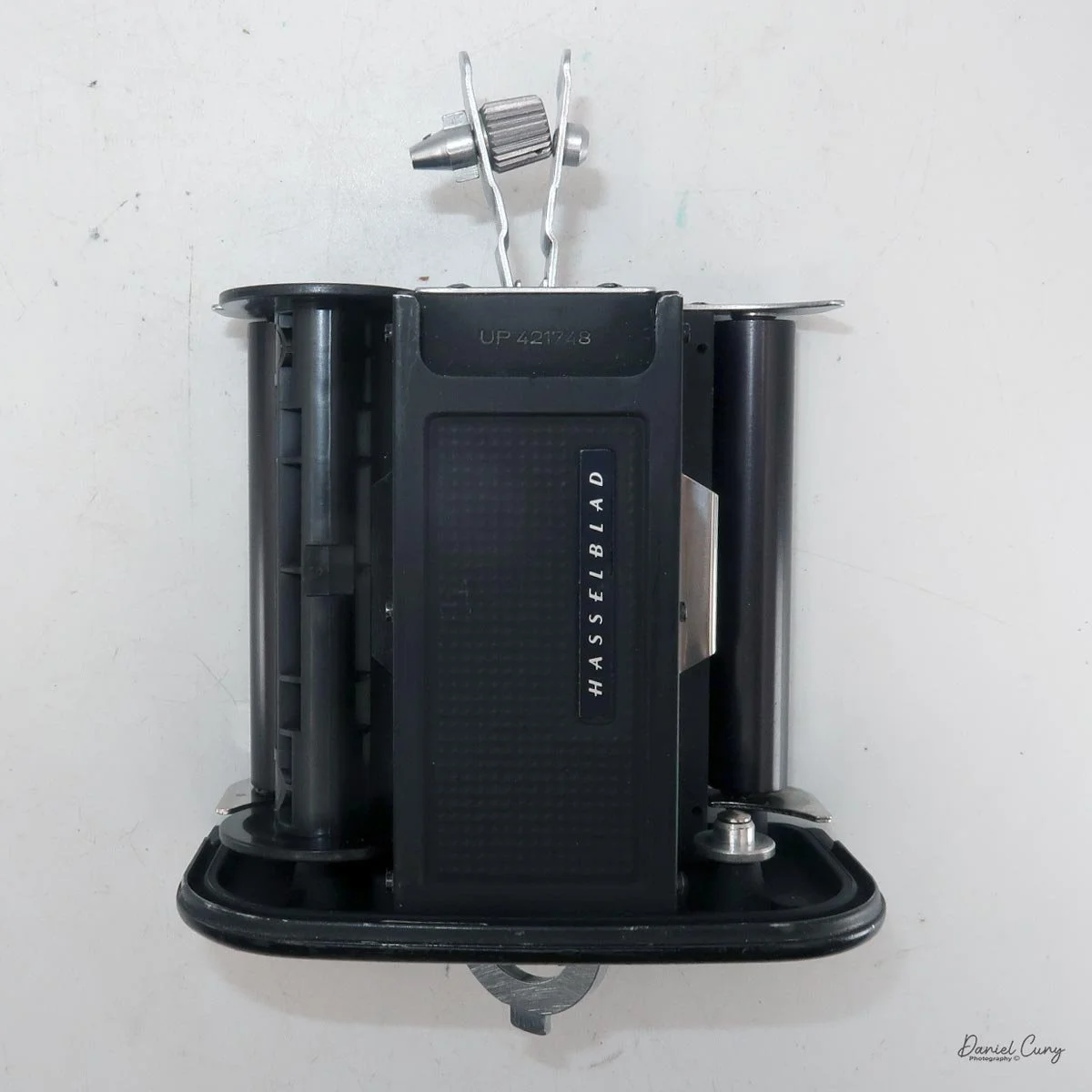 Flip up film holders to put film in back