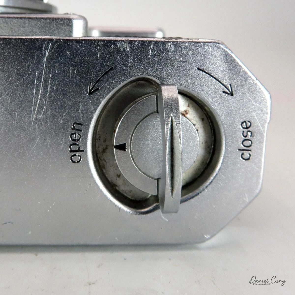 Once loaded, lock the film door.