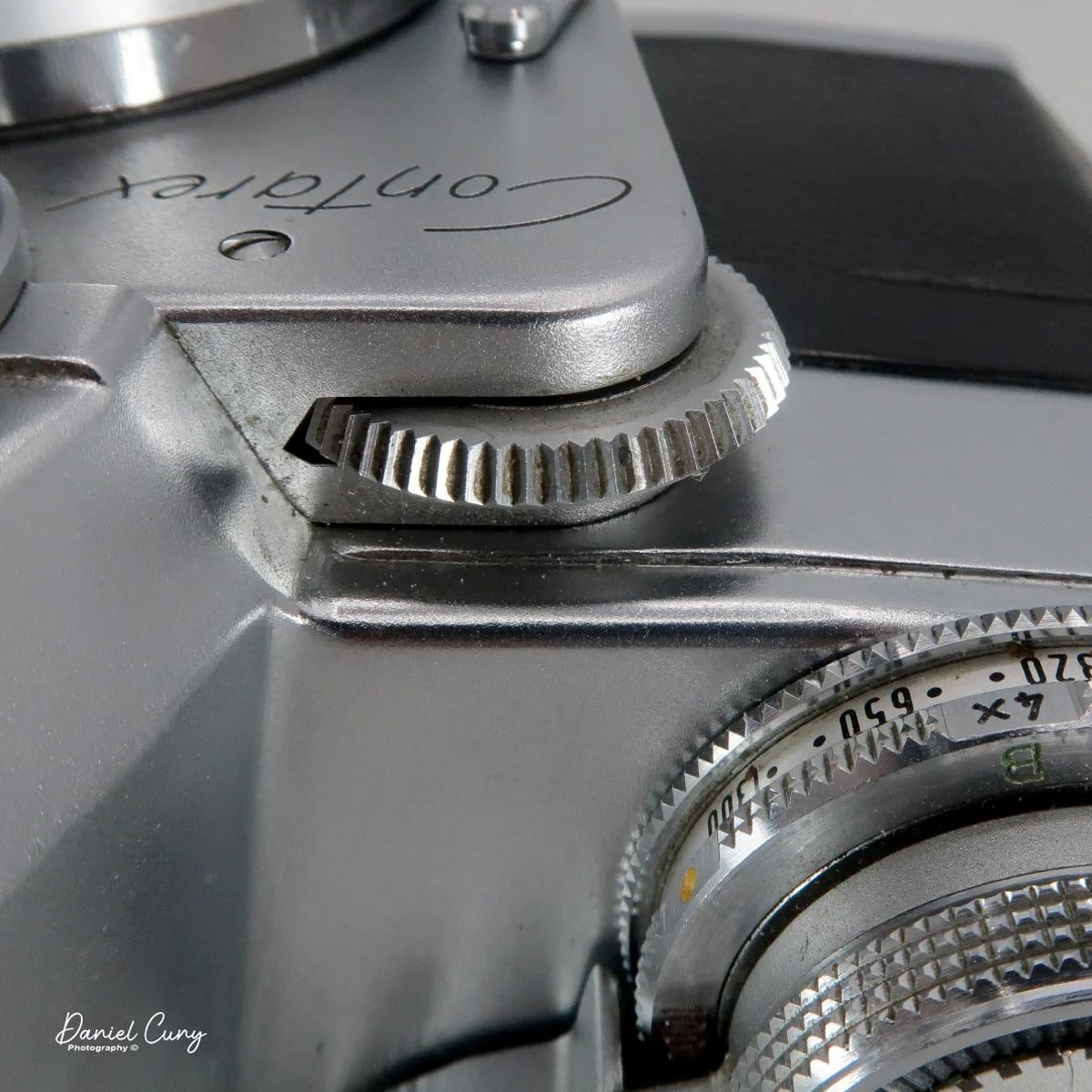 Knurled ring to set aperture