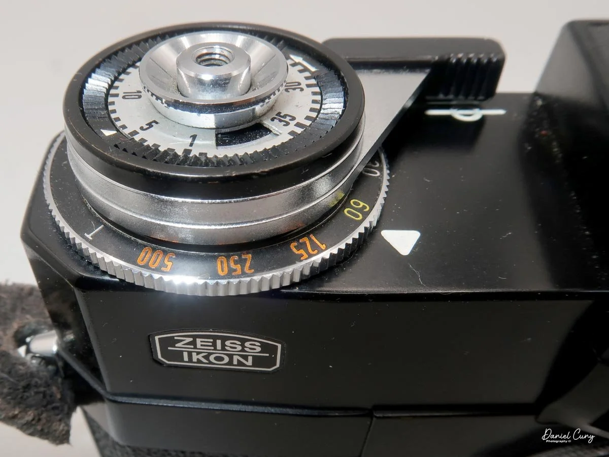 Winding lever, shutter release and shutter speed wheel.