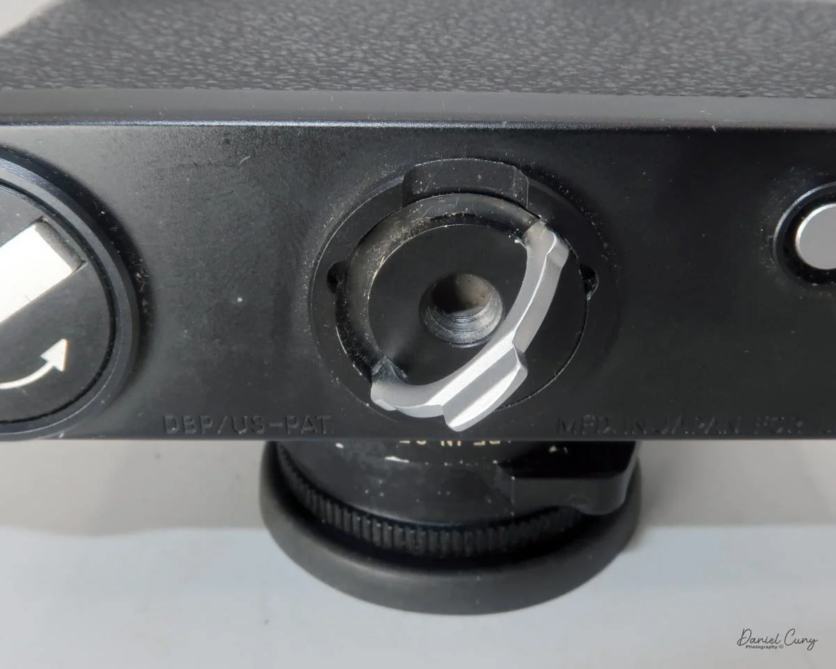 Unlock film door by twisting lever