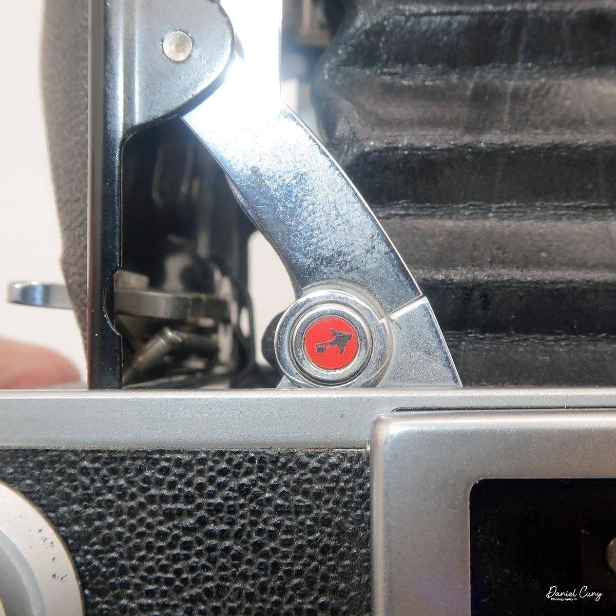 Pull in the direction of the arrow to close Standard camera
