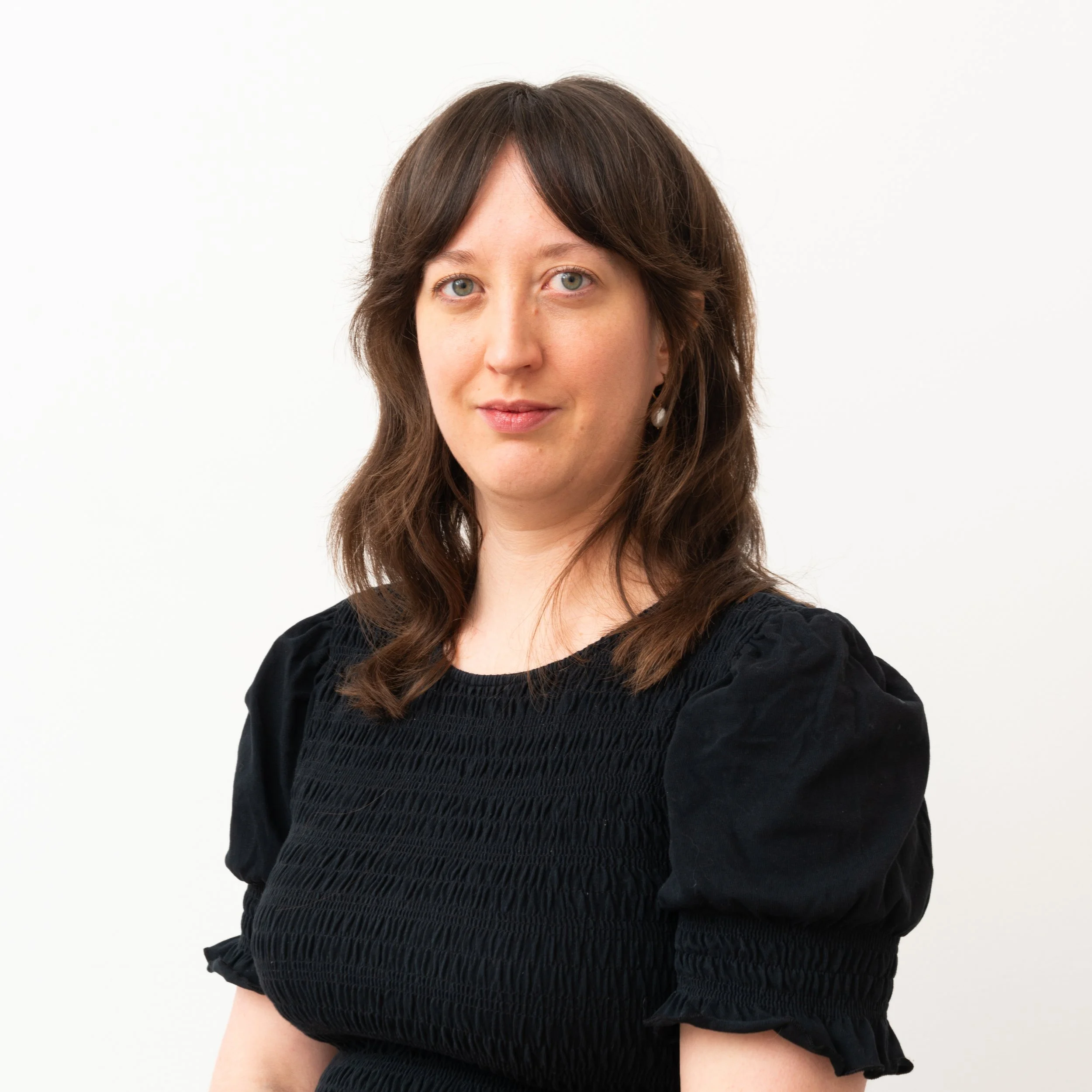 Headshot of Katherine Harvath, Credentialed Appraiser at DeGroot Fine Art, a full-service corporate art consulting firm