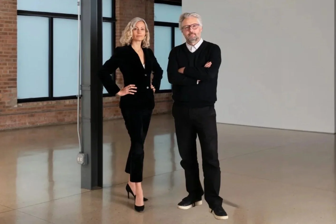 Headshot of Claire Warner and Sam Vinz, Credentialed Appraisers at DeGroot Fine Art, a full-service corporate art consulting firm