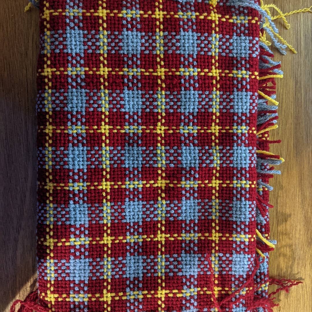 Recent project taken off the loom. The frayed ends are from color transitions that were woven out of both sides of the fabric. It'll go through the wash and when the fibers are properly secure will be trimmed back. #scarf #diy #weaving #crafting #cra