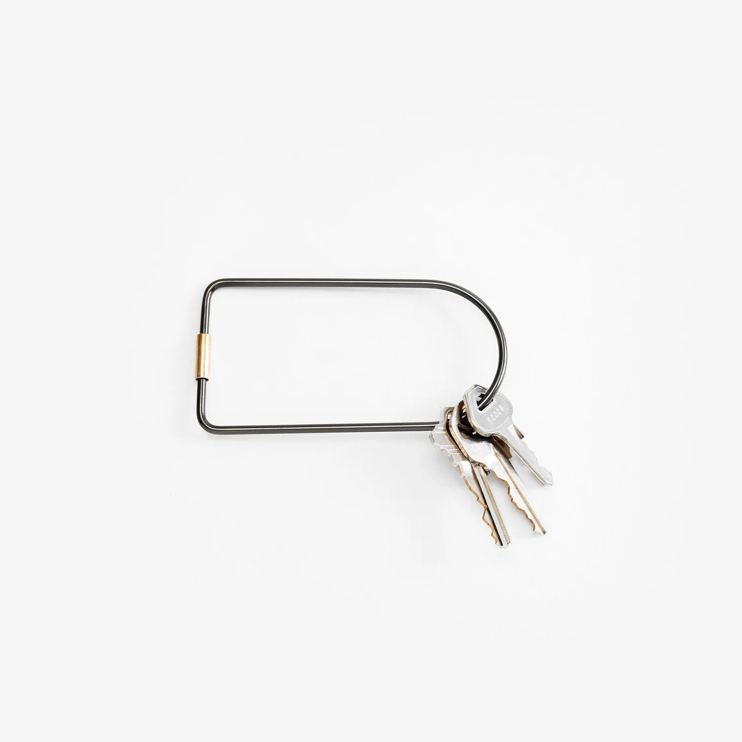 black and brass contour keyring 
