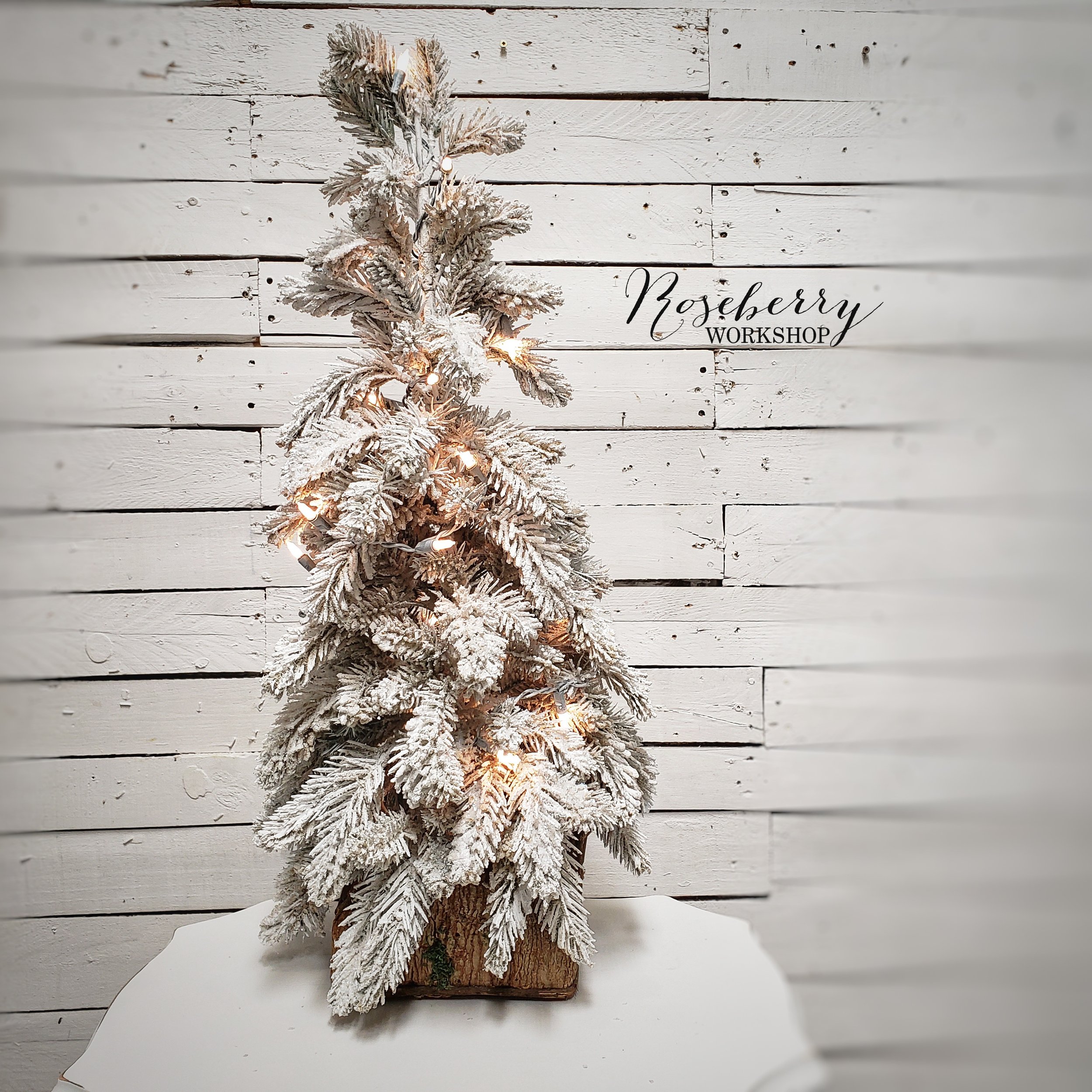 Snowy Flocked Table Top Tree With White Lights