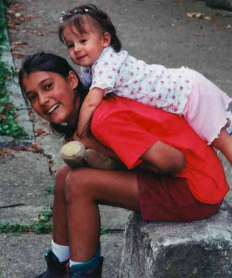 Ramona in 2001, with a Caba cousin.