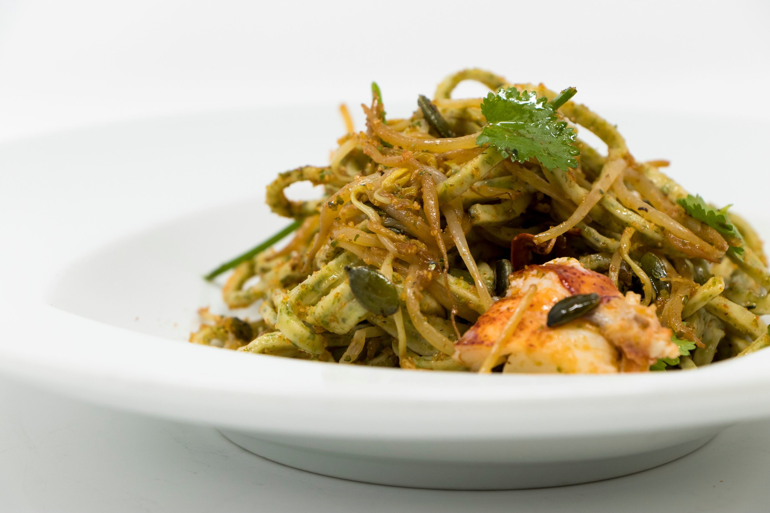 The professional photo of Spaghetti alla chitarra (made with algae) con astice (lobster). Photo by Daruma.