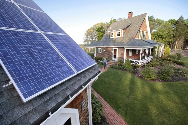 Outfitting a house with solar energy panels is one step towards creating a net-zero energy building. STEPHAN SAVOIA/ASSOCIATED PRESS