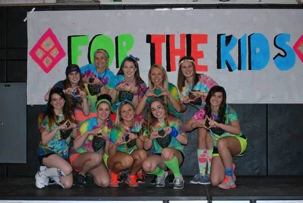 Four Diamonds Mini-THON students from Thomas Jefferson High School throw their diamonds in the air at their 2014 Mini-THON. (Credit to fourdiamonds.org)