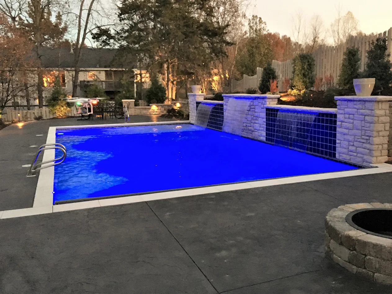 Gunite-Sundeck-waterfalls-lights-long.jpg