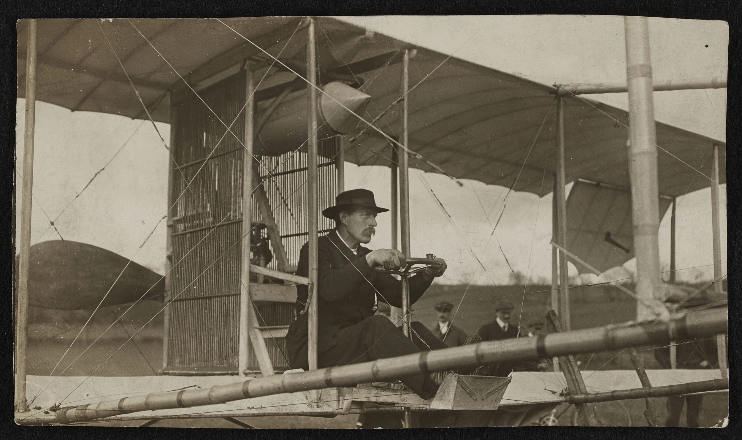 Revd Sidney Swann at the controls of his home-made flying machine
